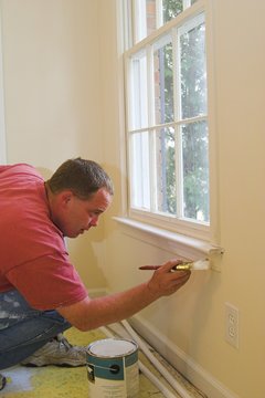 painter working inside home