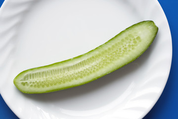 cucumber on white plate