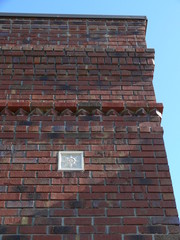 brick wall with terra cotta © Jim Cox