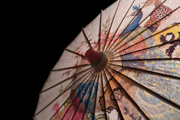 paper parasol on black iso