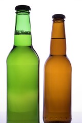 two beer bottles with no labels