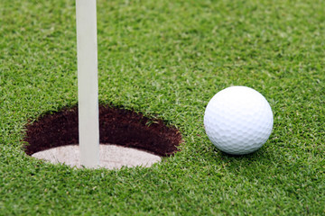 golf ball near pin
