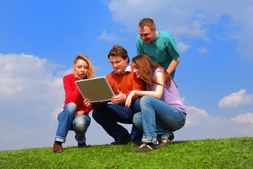 group of people with notebook