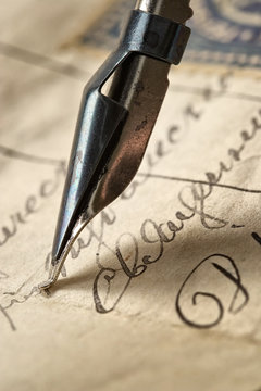 ancient letter and ink feath