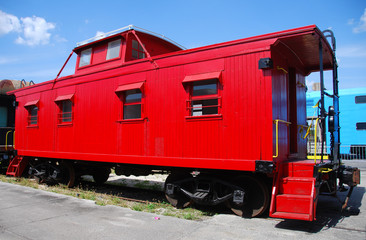 old railway car in red color