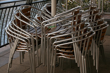 stacked bar chairs outside