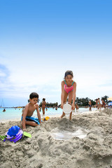 having sandcastle fun at the beach.