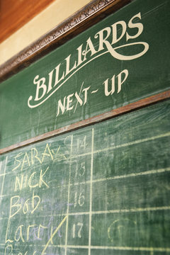 sign-up chalkboard for billiards.