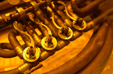 detail of an old brass instrument