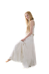 young girl in long withe dress