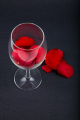 rose petals in a wine glass