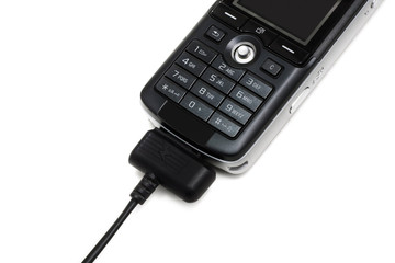 mobile phone charging (isolated on white)