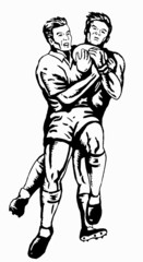 rugby 2 players jumping catching ball