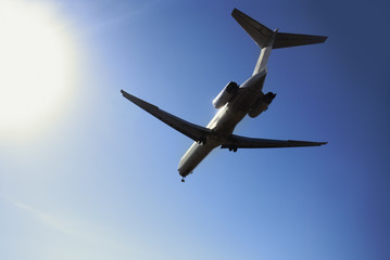  airliner landing at dusk