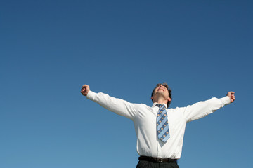 businessman with arms outstretched