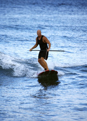 Fototapeta premium surfing the waves