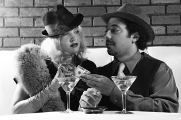 retro male giving money to retro female.