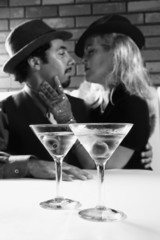 retro male and female looking into eachother's eyes.