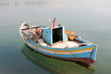 Fototapeta na wymiar anchored little fishing boat