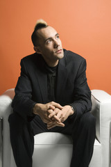 man wearing suit.