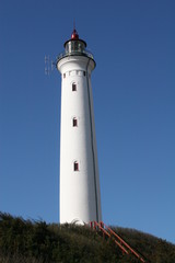 Fototapeta na wymiar leuchtturm bei hvide sande
