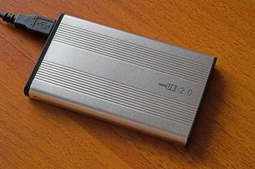 external usb hdd on wooden table