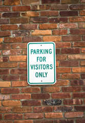 visitors parking sign