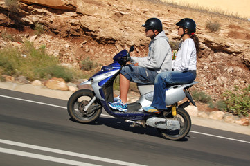 people on the scooter