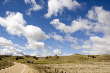 wind powered pump with tank in countryside