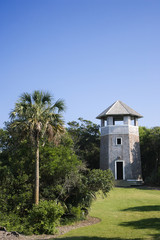 Fototapeta na wymiar Lighthouse shaped building on Bald Head Island, North Carolina.