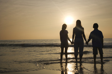 Mom and kids at beach.