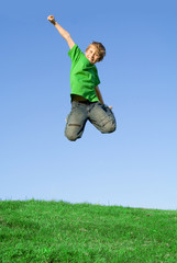 happy child jumping for joy
