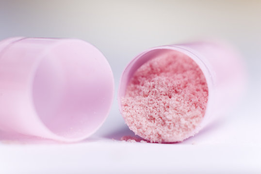 opened pink capsule
