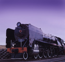 steam locomotive at dawn