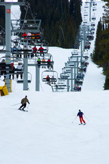 busy snow ski resort with chairlift