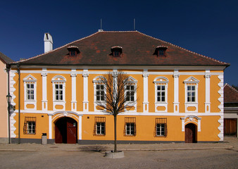 nice historical yellow house and blue sky