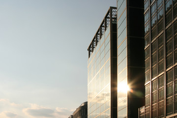 sunset on glass building