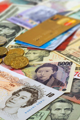 currency, coins and credit cards