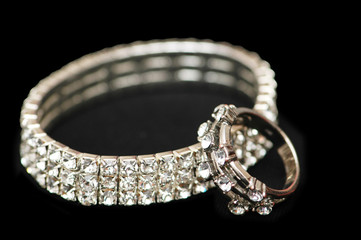 diamond bracelet and ring isolated on black