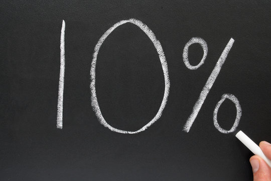 writing 10% on a blackboard.