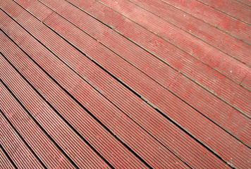 red wood decking floor panels.