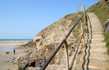 steps up the cliffs from the beach in perranporth,