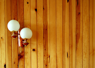 lantern on wooden wall