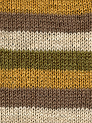 knitted wool stripes close up background.