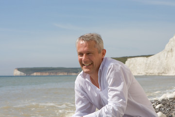 Fototapeta na wymiar laughing man on beach