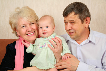 grandparents with baby