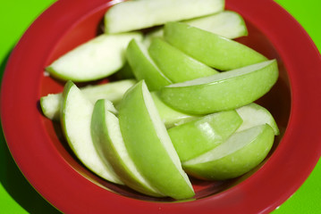 Sliced apple pieces red and green