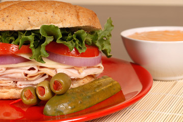 turkey and swiss cheese sandwich with red pepper dipping sauce