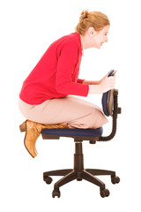 Fototapeta premium businesswoman playing on office chair