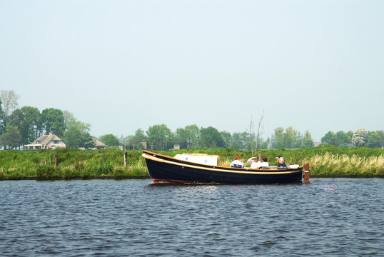a sloop on the river